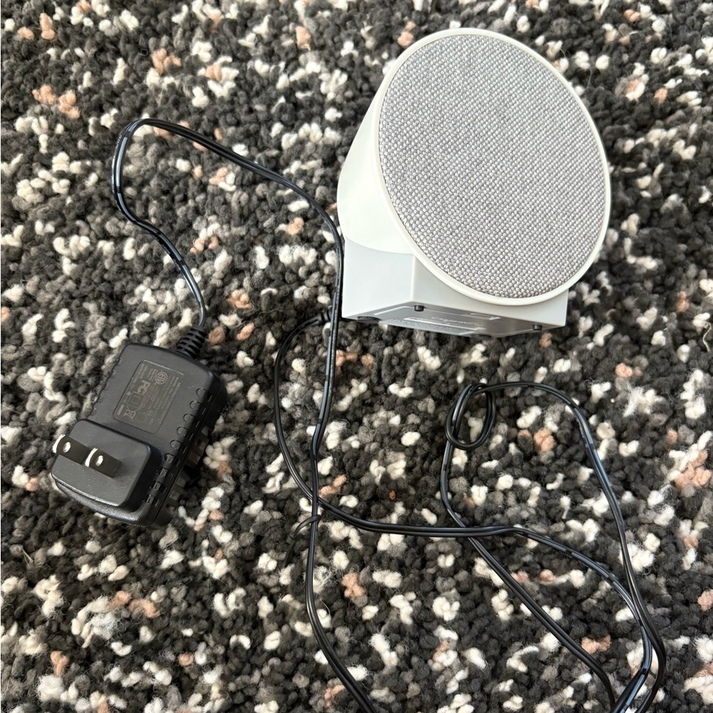 Compact Gray alarm clock with plug in